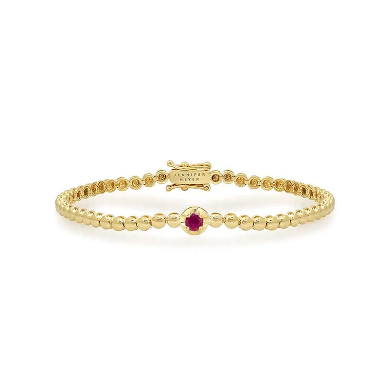 Bezel Tennis Bracelet With Illusion Set Ruby Center