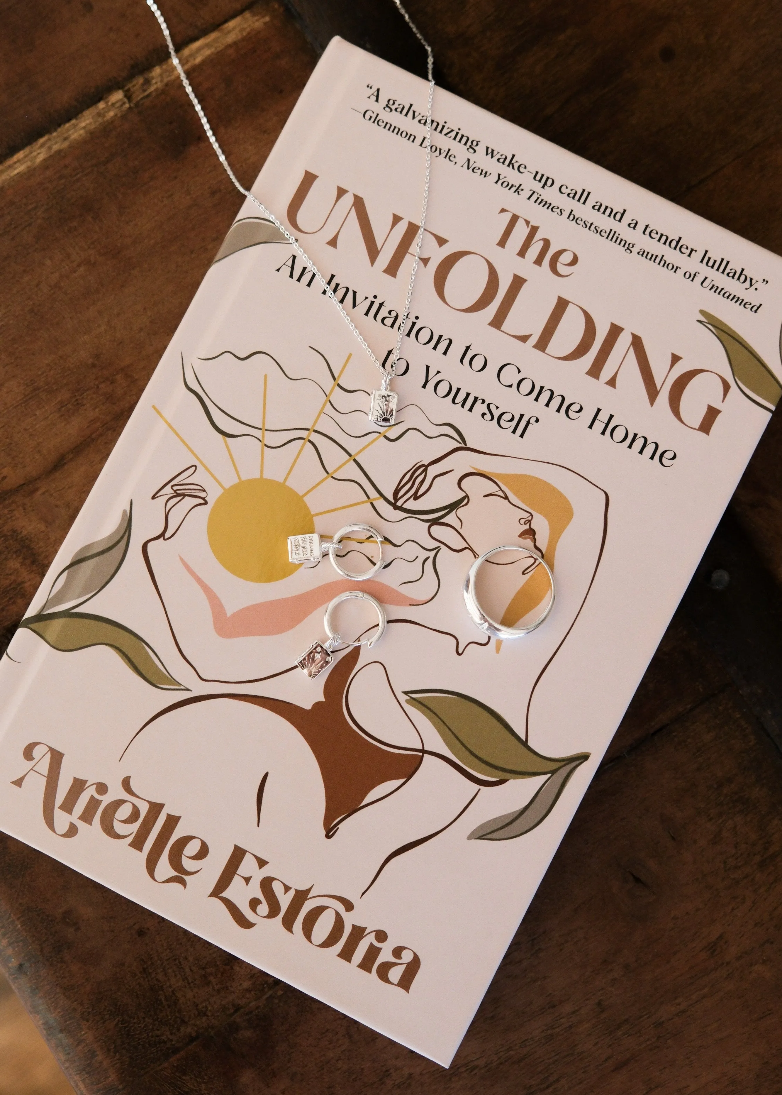 Cosmic Unfolding Book Charm