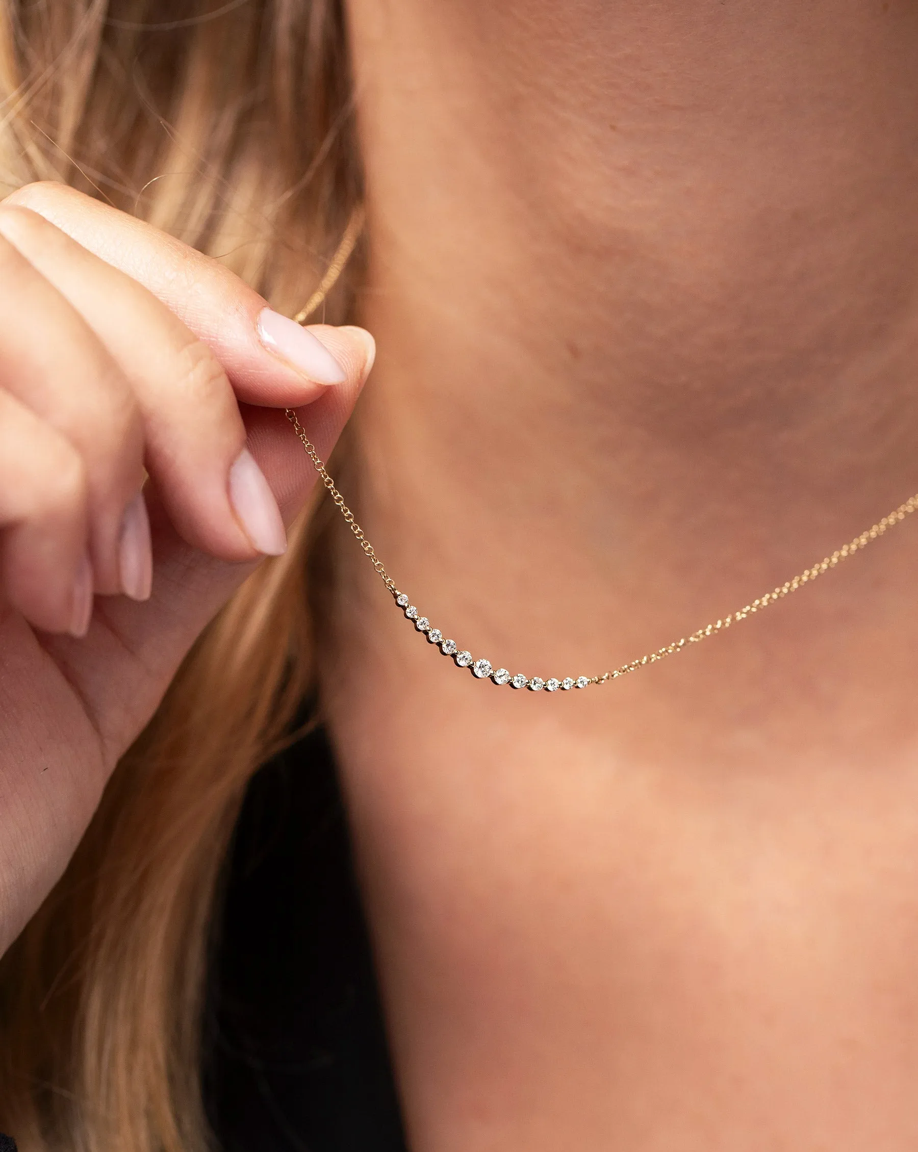 Graduated Single Prong Diamond Necklace