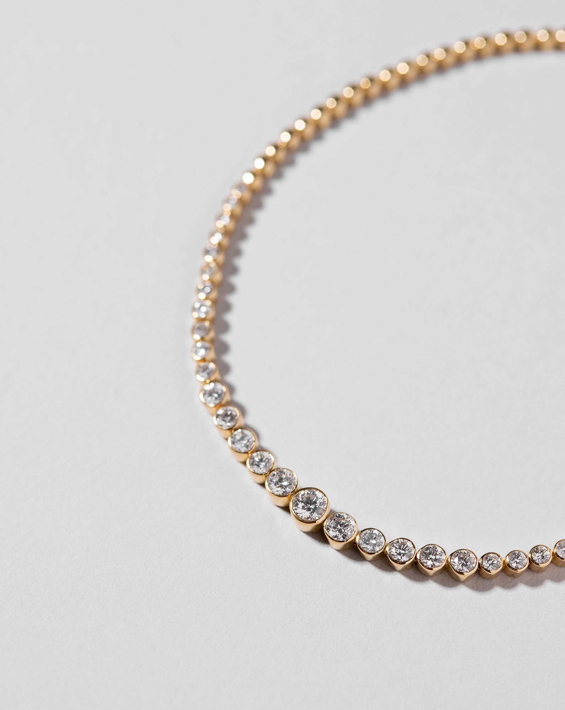 Graduated Bezel Diamond Tennis Bracelet
