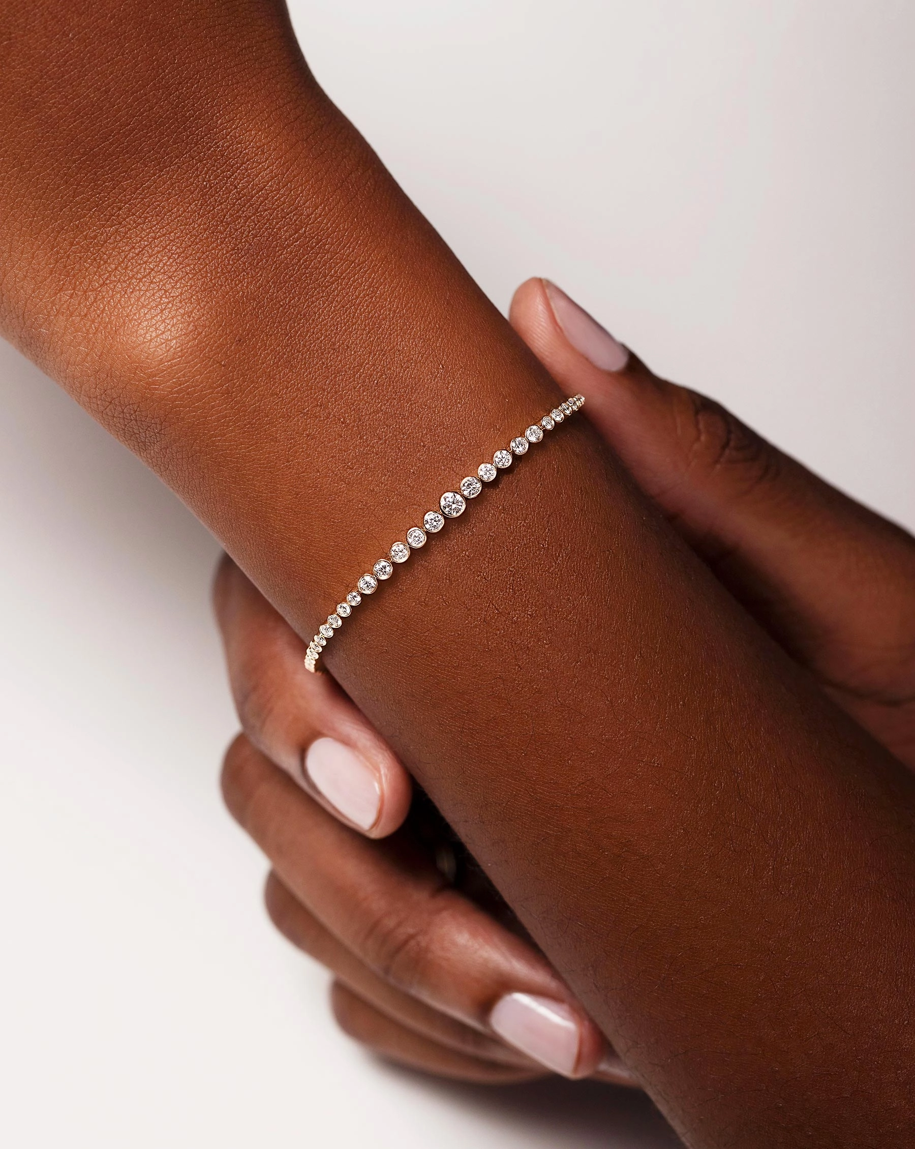 Graduated Bezel Diamond Tennis Bracelet