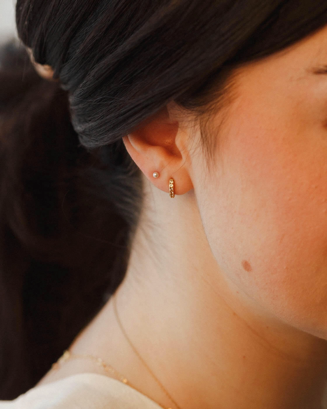 Ona White Sapphire Huggie Hoops