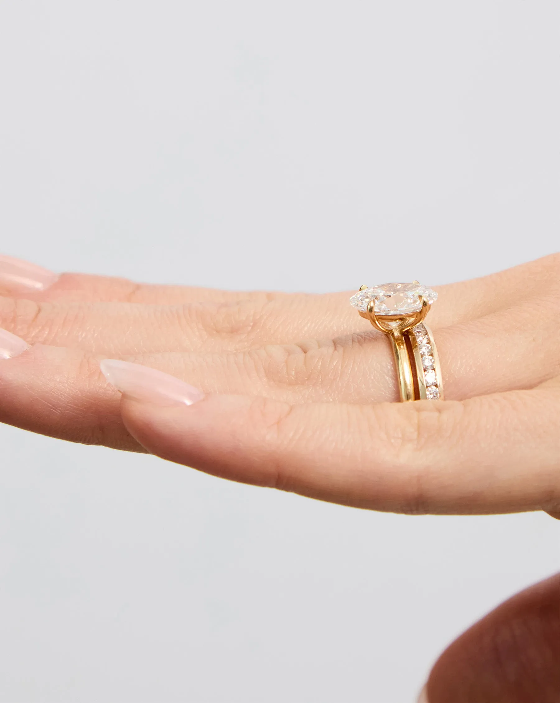 Round Diamond Channel Set Eternity Band