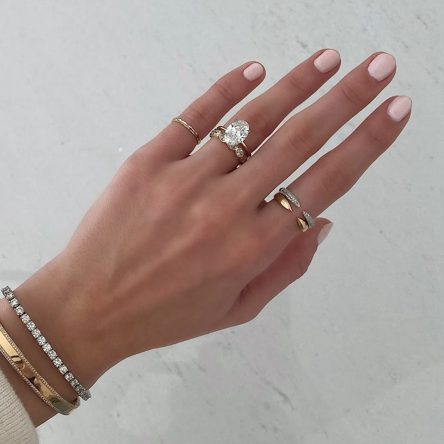 Sideways Oval Bezel Eternity Band
