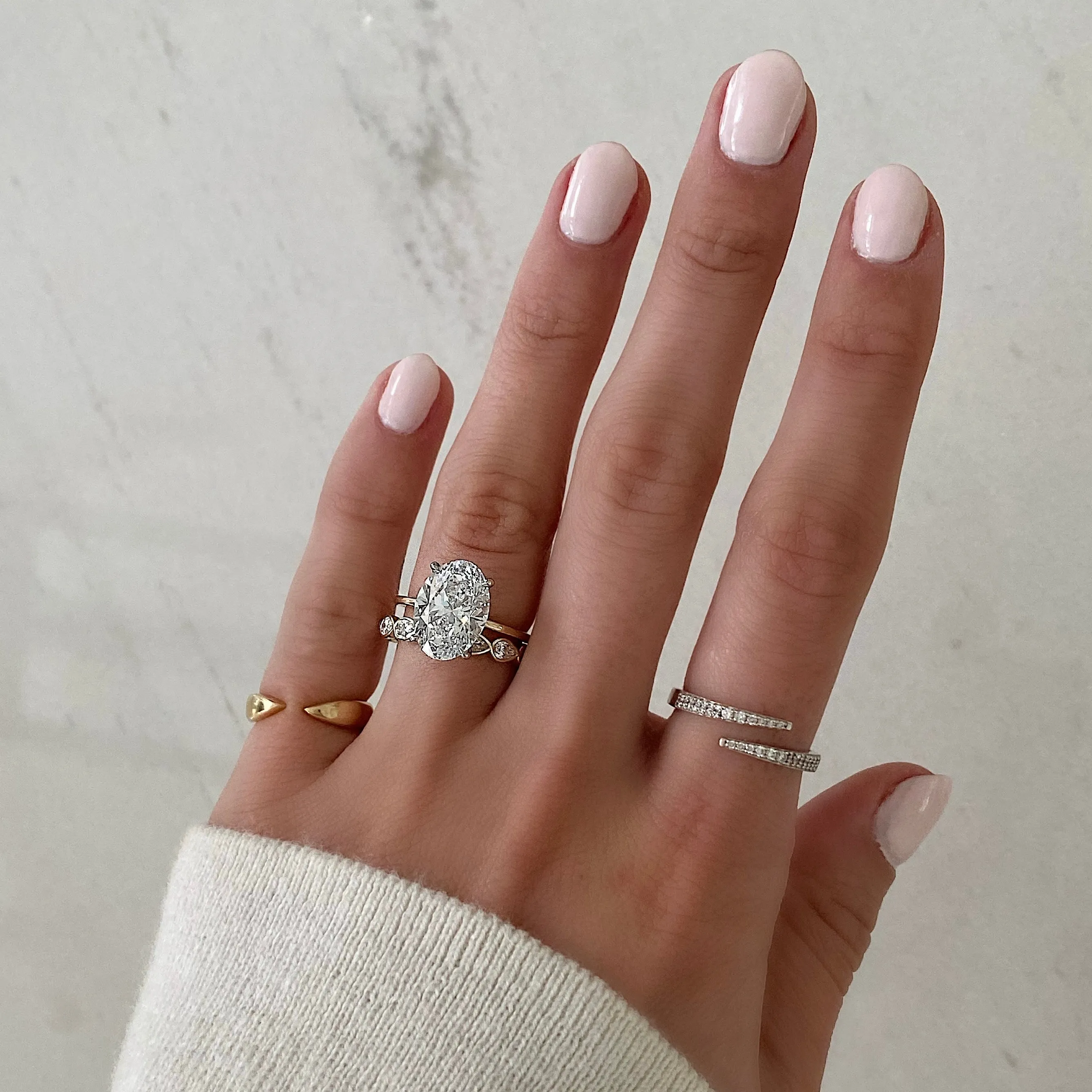Sideways Pear Bezel Eternity Band